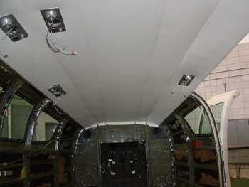 New headliner installed in gutted aircraft.