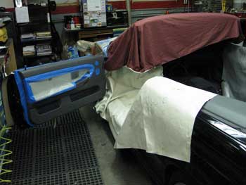 Car with seats in need of repair.