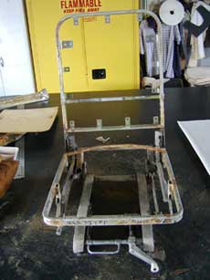 Seat in process of being repaired.